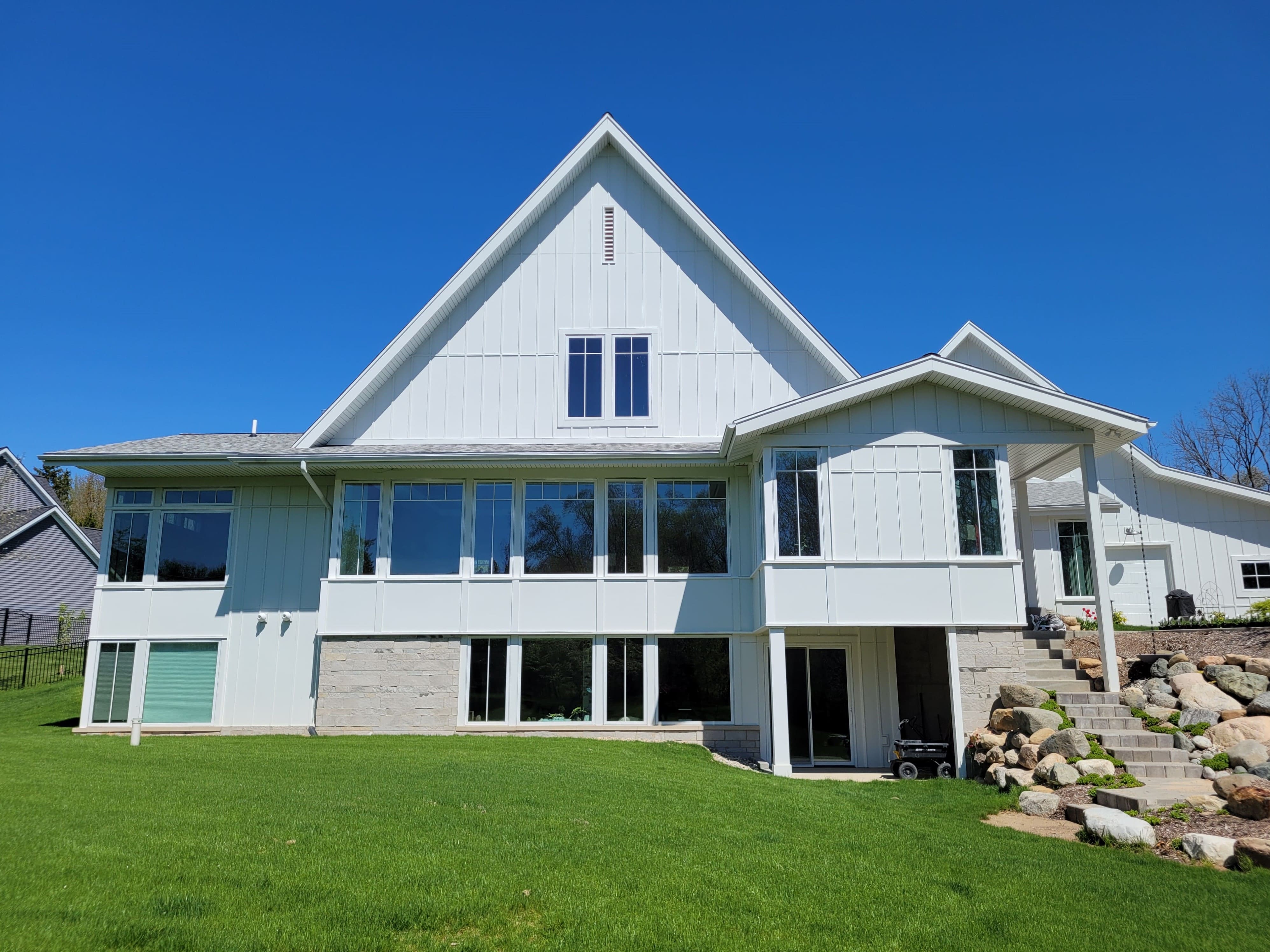 Modern exterior custom home backyard with landscaping-1