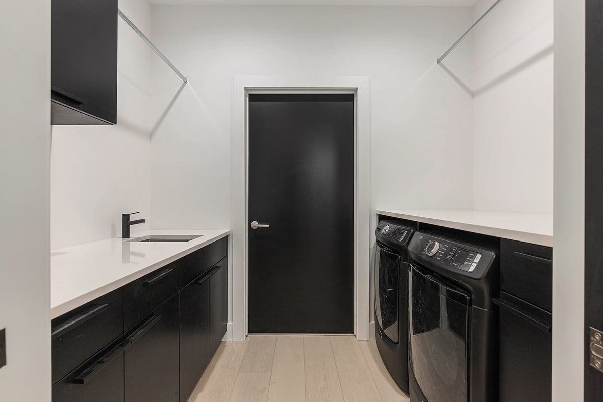 Spacious laundry room with sink in a custom home built by R-Value Homes in West Michigan